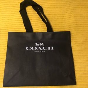 Coach paper bags,1 lg black paper bag, 1 ex.lg brown paper bag, 1 sm brown paper